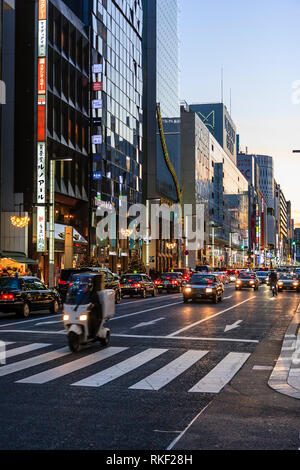 Tokyo, Ginza at golden hour. View along street, Louis Vuitton and