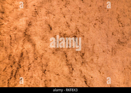 Light brown glossy velvet fabric format filling as background Stock Photo