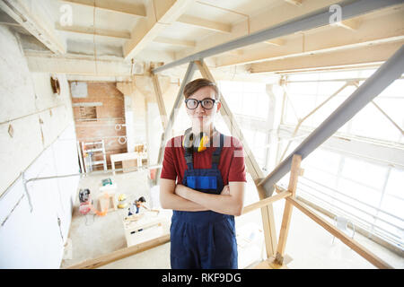 Young carpenter in glasses Stock Photo