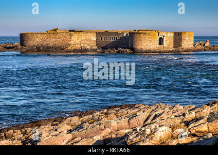 View of Fort Houmet Herbe' from La Petite Folie on the Alderney mainland. Stock Photo