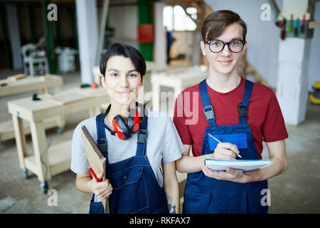 Carpentry students in workshop Stock Photo