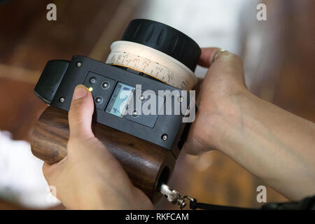 Remote focus for professional film camera in the hands of an assistant Stock Photo