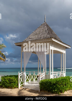 Outdoor wedding pagoda on Caribbean Beach Stock Photo