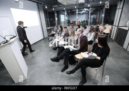 coach leads the session with the business team Stock Photo