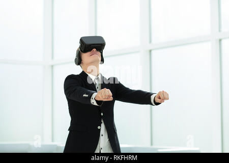 happy young businessman in virtual reality helmet Stock Photo