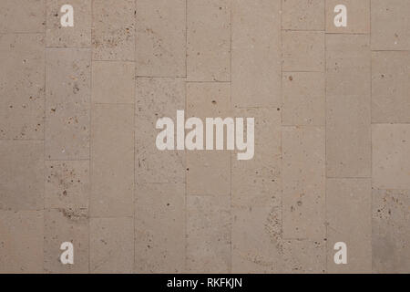 coquina background old fossil.Building blocks from sandstone. Rough texture of bricks made of sand and seashells Stock Photo