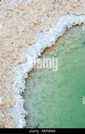 Close up view of salt crystals and mineral formation on the shore of Dead Sea in Israel. Health and beauty care Stock Photo