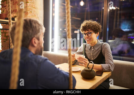 Having tea in cafe Stock Photo