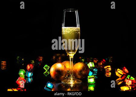 USA, Illinois, Metamora, Martini glasses with candies inside against  illuminated Christmas tree Stock Photo - Alamy