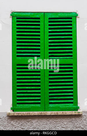 Green window shutter Stock Photo