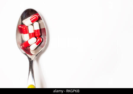 pills in the spoon - flat style Stock Photo