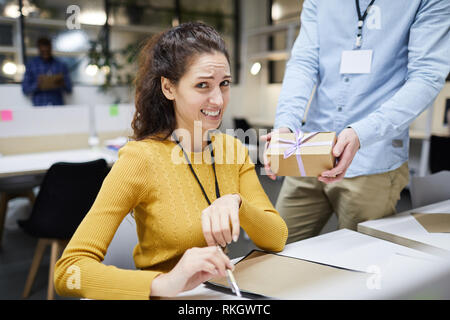 Disgusted by colleagues gift Stock Photo