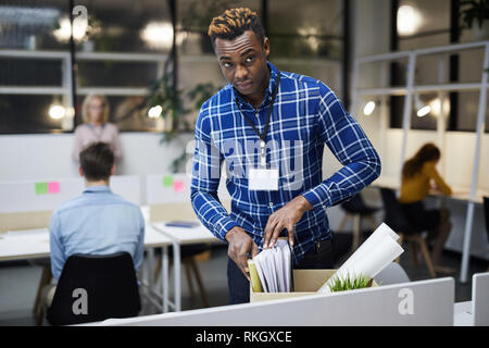 Black man discharged from place of employment Stock Photo