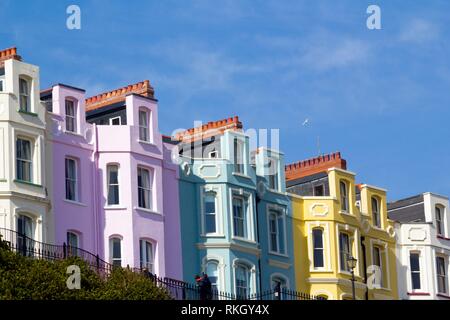 Vibrant pastel coloured guest houses on the cliff top at Tenby, Pembrokeshire, Wales, UK.