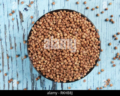 Bowl of coriander seeds Stock Photo