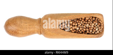 Cumin or caraway seeds in wooden spoon isolated on white background. Top view Stock Photo