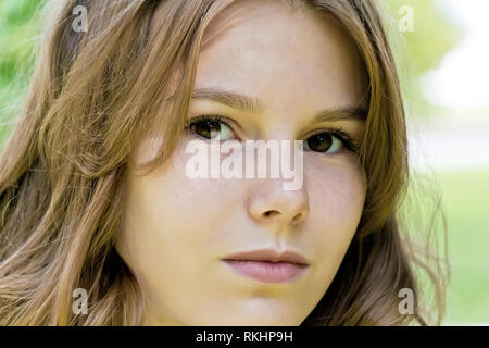 Portrait of cute blond girl fourteen years old Stock Photo