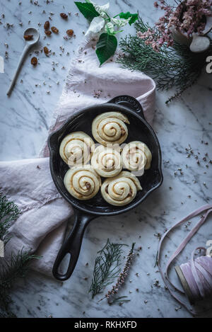 Fresh cinnamon rolls on table Stock Photo