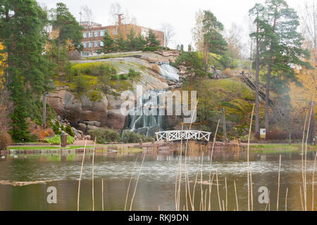 Waterfall cascading over rocks in Sapokka landscaping park Kotka, Finland. Stock Photo