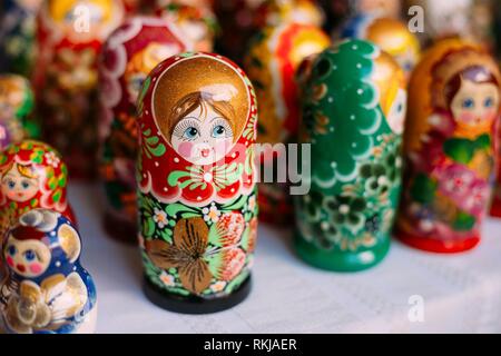 Close View Of The Colorful Matryoshka, The Traditional Russian Nesting Dolls, The Famous Old Wooden Souvenir At The Showcase.