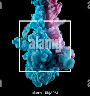color splashes of ink in water isolated on black Stock Photo