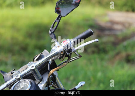 Details of a motorcycle with a stroller Stock Photo