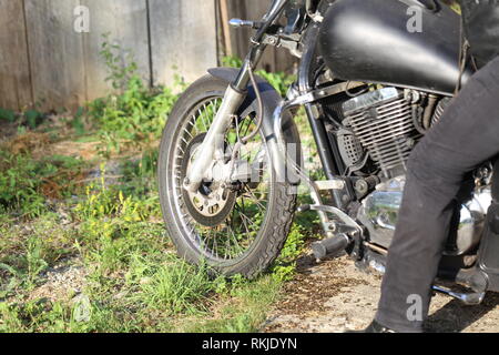 Details of a motorcycle with a stroller Stock Photo