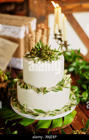 Elegant wedding cake with flowers and succulents Stock Photo