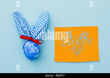 Happy Easter card and handmade bunny. Stock Photo