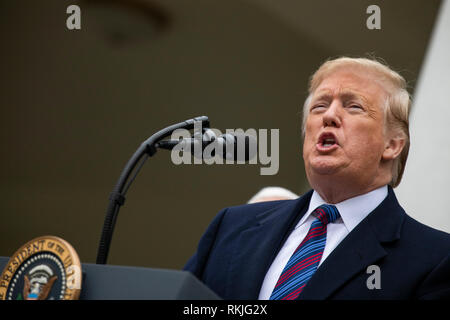 President Donald Trump speaks with reporters upon arriving at Chicago O ...