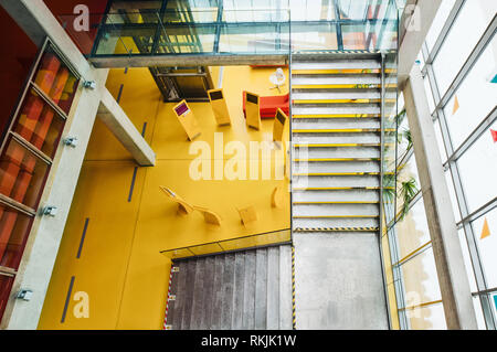 High-angle view of interior of a modern spacious library with computers for public. Stock Photo
