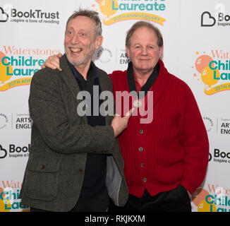 Waterstone’s Piccadilly, London, UK. 11 February, 2019. As part of the Waterstones Children’s Laureate 20th anniversary celebrations, former Laureates reunite to mark the publication of the new Laureate anthology Flights of Fancy (Walker Books). Image: Michael Rosen with Michael Morpurgo. Credit: Malcolm Park/Alamy Live News. Stock Photo