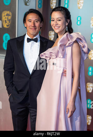Jimmy Chin and Elizabeth Chai attends the EE British Academy Film Awards at the Royal Albert Hall, London. Stock Photo