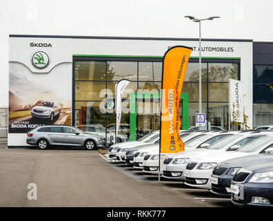 Strasbourg, France - Nov 7 2017: Skoda Showroom Grand Est Automobiles view from street with row of new cars for sale large stock in wide parking lot Stock Photo