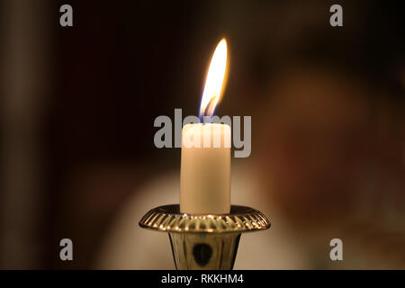 Burning candles / Burning candles on a blurred background Stock Photo