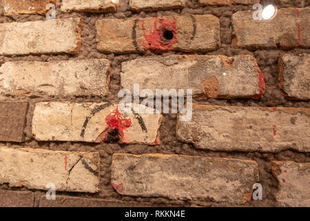 The Valentines Day Massacre Wall (from S-M-C Cartage Company warehouse at 2122 North Clark St, Chicago) on display in the Mob Museum, Las Vegas, Stock Photo
