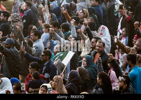 Pakistani crowd at border ceremony in Wagah, Lahore, Punjab, Pakistan Stock Photo