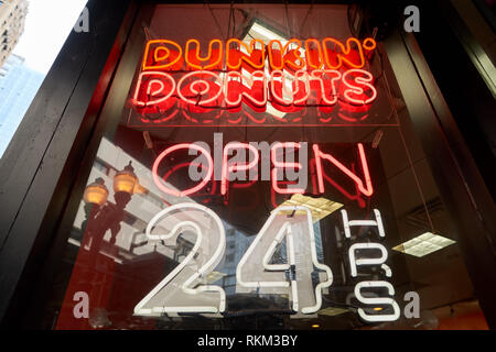 CHICAGO, IL - CIRCA MARCH, 2016: close up shot of Dunkin' Donuts open 24 hours sign. Dunkin' Donuts is an American global donut company and coffeehous Stock Photo