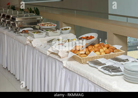 Served Food at Big Long Buffet Table Stock Photo