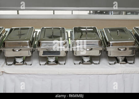 Food Warmers Trays Ready at Buffet Table Stock Photo