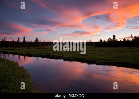 WY03415-00...WYOMING - Sunset reflecting in the Gibbon River near the Norris Geyser Basin in Yellowstone National Park. Stock Photo