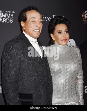 BEVERLY HILLS, CA - FEBRUARY 09: Smokey Robinson (L) and Frances Glandney attend The Recording Academy And Clive Davis' 2019 Pre-GRAMMY Gala at The Be Stock Photo