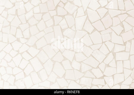 Broken tiles mosaic seamless pattern. Cream tile wall high resolution real photo or brick seamless and texture interior background. Stock Photo