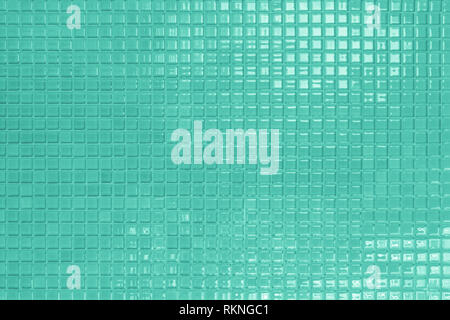 Green or Blue ceramic wall and floor tiles abstract background. Design geometric mosaic texture for the decoration of the bedroom. Simple seamless pat Stock Photo