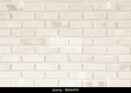 Cream and Brown brick wall texture background. Brickwork or stonework flooring interior rock old pattern clean concrete grid uneven bricks design stac Stock Photo