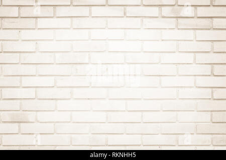 Cream and Brown brick wall texture background. Brickwork or stonework flooring interior rock old pattern clean concrete grid uneven bricks design stac Stock Photo