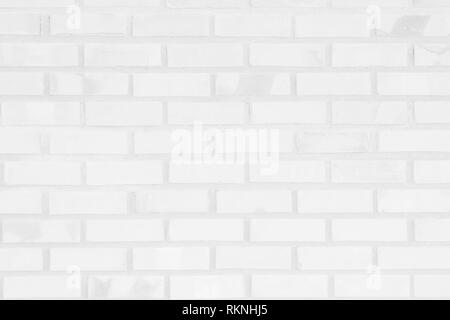 White and Gray brick wall texture background. Brickwork or stonework flooring interior rock old pattern clean concrete grid uneven bricks design stack Stock Photo