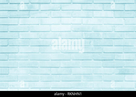 Brick wall painted with pale blue paint pastel calm tone texture background. Brickwork and stonework flooring interior rock old pattern clean concrete Stock Photo