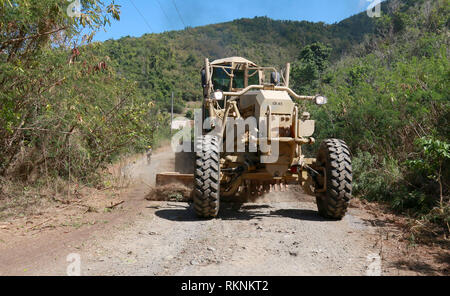 Members from the 662nd Engineer Company, Virgin Islands National Guard conducts road clearing operations at Hams Bluff area St. Croix, Feb. 09, 2019. The 662nd EN Co will be conducting MOS related training throughout this month’s inactive duty training (IDT).  (U.S. Army National Guard photo by Staff Sgt. Gregory Camacho) Stock Photo