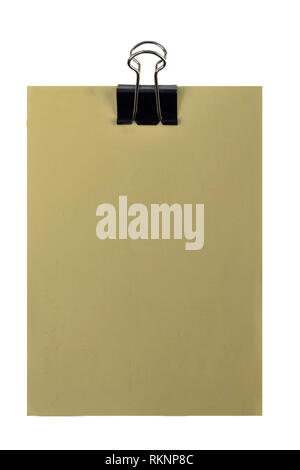 yellow paper with blank space for text, message or memo and black clip on white background Stock Photo